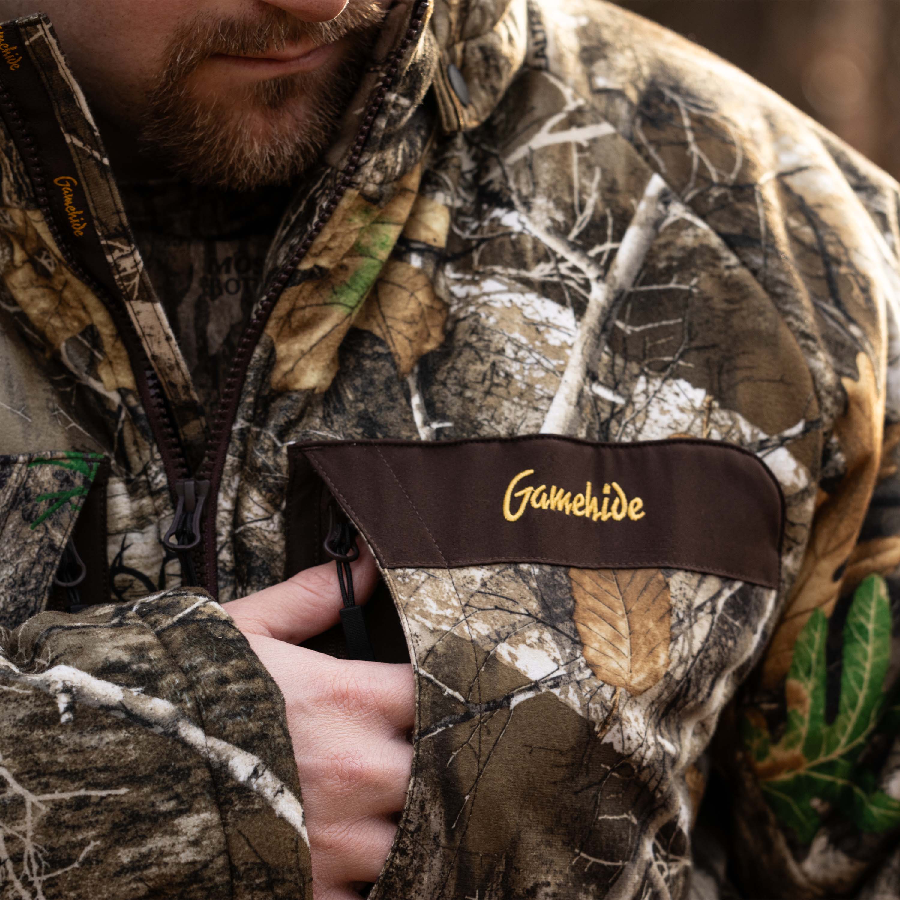 Load image into Gallery viewer, Cold weather parka hunting front pocket view
